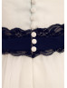 A-line Ivory Satin Tulle Knee Length Flower Girl Dress With A Navy Blue Sash